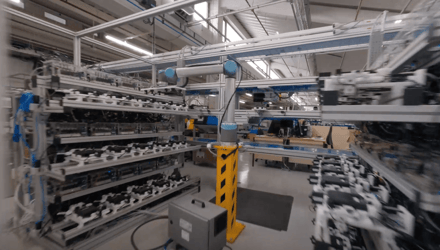 automated robotic arm for cpe returns